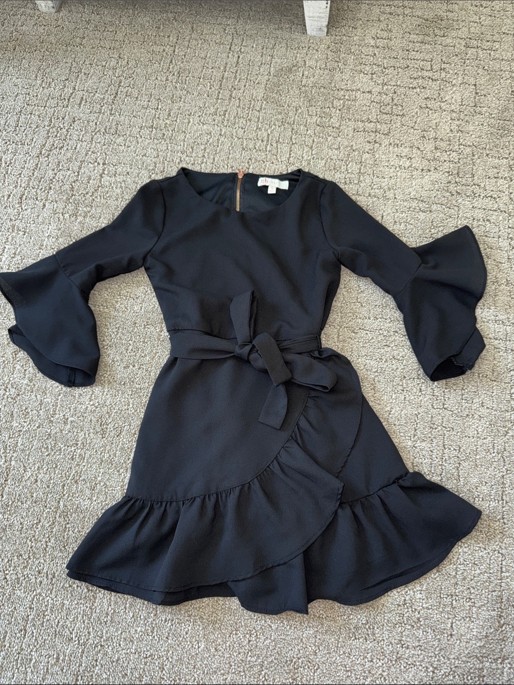 Girl’s Black Ruffle Wrap Dress with Bell Sleeves